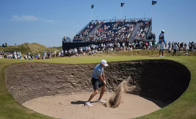 Jordan Spieth of the United States plays out of a bunker on the 7th green during a practice round for the British Open Golf championships at Royal Birkdale golf club, in Southport, England, Tuesday, July 14, 2026. (AP Photo/Jon Super)