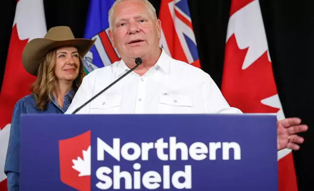 Ontario Premier Doug Ford and Alberta Premier Danielle Smith, left, announce the Northern Shield pipeline proposal in Calgary, Canada, Monday, July 6, 2026. (Jeff McIntosh/The Canadian Press via AP)