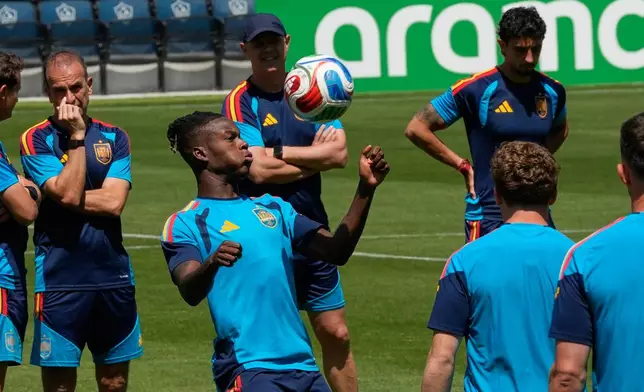 Spain's Nico Williams and teammates attend a training session ahead of a World Cup quarterfinal soccer match against Belgium in Carson, Calif., Thursday, July 9, 2026. (AP Photo/Andre Penner)