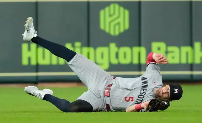 Minnesota Twins center fielder Ryan Kreidler catches a fly ball by Houston Astros' Nick Allen during the eighth inning of a baseball game Tuesday, June 30, 2026, in Houston. (AP Photo/David J. Phillip)