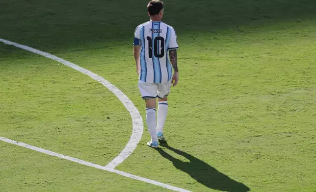 Argentina's Lionel Messi (10) walks on the pitch during the World Cup final soccer match between Spain and Argentina in East Rutherford, N.J., near New York, Sunday, July 19, 2026. (AP Photo/Adam Hunger)