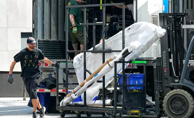 A truck is unloaded outside New York's Madison Square Garden, Wednesday, July 1, 2026. (AP Photo/Richard Drew)
