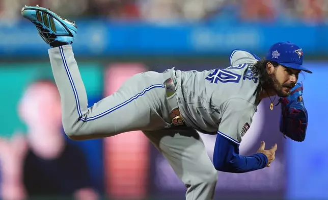Toronto Blue Jays' pitcher Dylan Cease throws during the first inning of the MLB baseball All-Star Game between the American League and National League, Tuesday, July 14, 2026, in Philadelphia. (AP Photo/Matt Rourke)