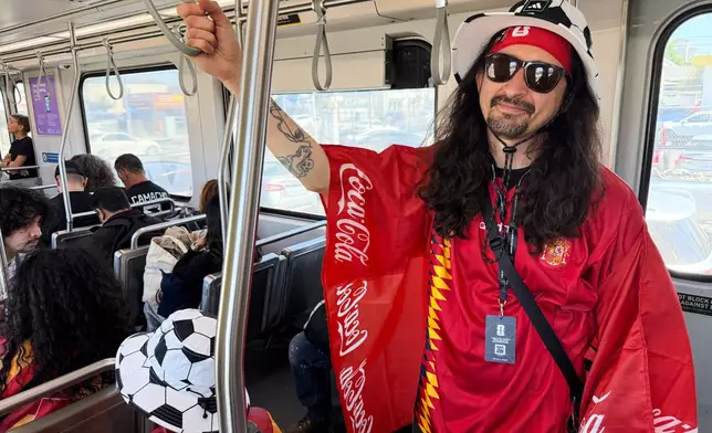 Dave Ramazzini rides the Metro after a World Cup match between Spain and Austria on Thursday, July 2, 2026, in Los Angeles. (AP Photo/Jaimie Ding)