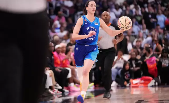 Team Spoon's Caitlin Clark looks to pass the ball during the first half of a WNBA All-Star basketball game against Team Coop in Chicago, Saturday, July 25, 2026. (AP Photo/Nam Y. Huh)