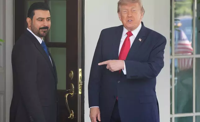President Donald Trump, gestures as he greets Iraq's Prime Minister Ali al-Zaidi at the White House, Tuesday, July 14, 2026, in Washington.(AP Photo/Alex Brandon)