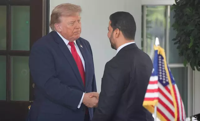 President Donald Trump greets Iraq's Prime Minister Ali al-Zaidi at the White House, Tuesday, July 14, 2026, in Washington.(AP Photo/Alex Brandon)