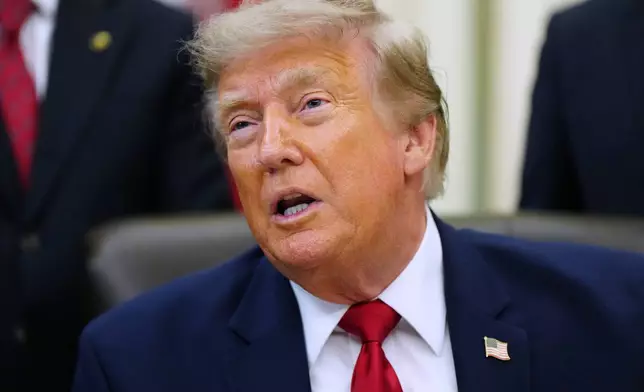 President Donald Trump speaks in the Oval Office of the White House, Monday, July 13, 2026, in Washington, as he signs executive orders. (AP Photo/Julia Demaree Nikhinson)