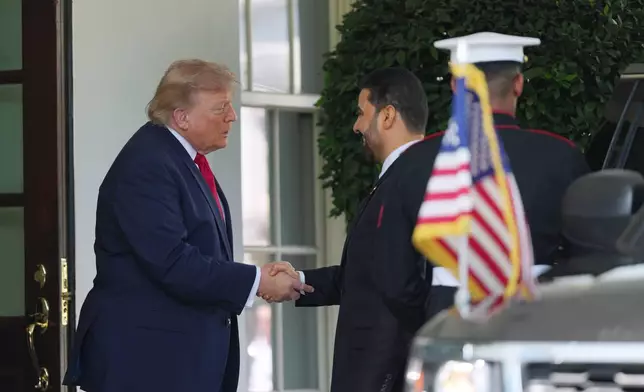 President Donald Trump greets Iraq's Prime Minister Ali al-Zaidi at the White House, Tuesday, July 14, 2026, in Washington. (AP Photo/Julia Demaree Nikhinson)