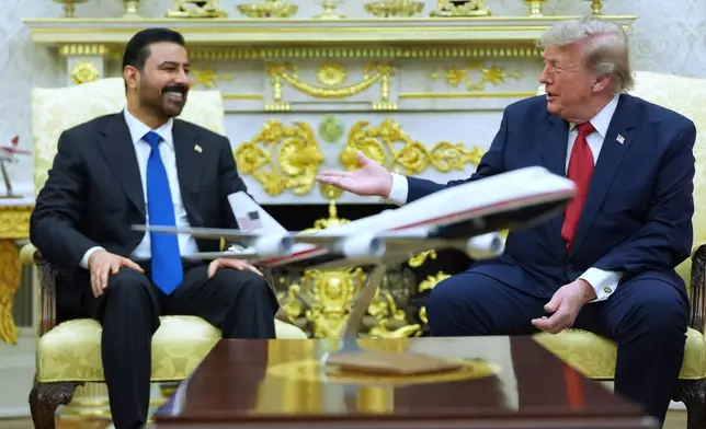President Donald Trump meets with Iraq's Prime Minister Ali al-Zaidi in the Oval Office of the White House, Tuesday, July 14, 2026, in Washington. (AP Photo/Julia Demaree Nikhinson)