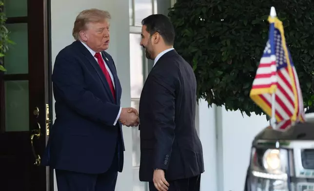 President Donald Trump greets Iraq's Prime Minister Ali al-Zaidi at the White House, Tuesday, July 14, 2026, in Washington. (AP Photo/Julia Demaree Nikhinson)