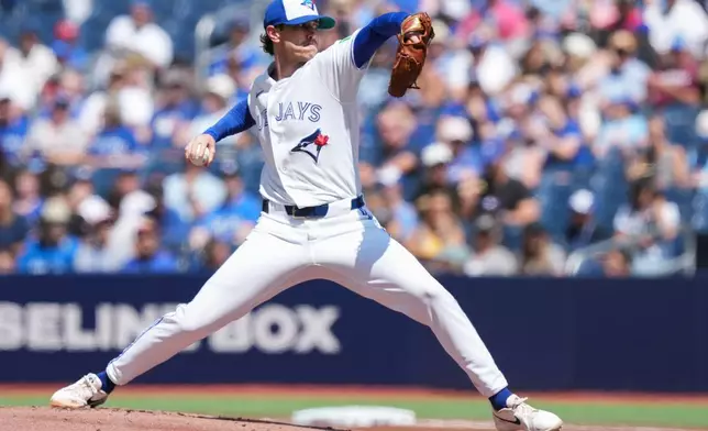 Toronto Blue Jays pitcher Shane Bieber pitches against the Tampa Bay Rays during the first inning of a baseball game in Toronto, Thursday, July 23, 2026. (Nathan Denette/The Canadian Press via AP)