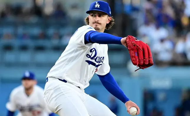 Los Angeles Dodgers starting pitcher Justin Wrobleski (70) throws pitch against the Seattle Mariners during the second inning of a baseball game Tuesday, July 28 2026, in Los Angeles. (AP Photo/Wally Skalij)