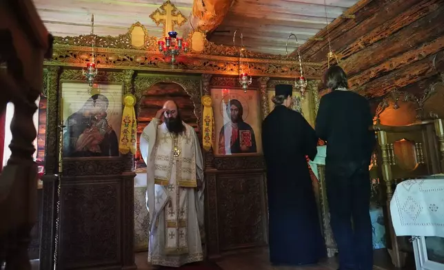 Estonia Monastery Bishop Damaskinos, centre left, prays during the Divine Liturgy in the chapel of the newly founded Kirikla Orthodox Monastery in Pihali village, Estonia, on July 4, 2026. (AP Photo/Sergei Grits)
