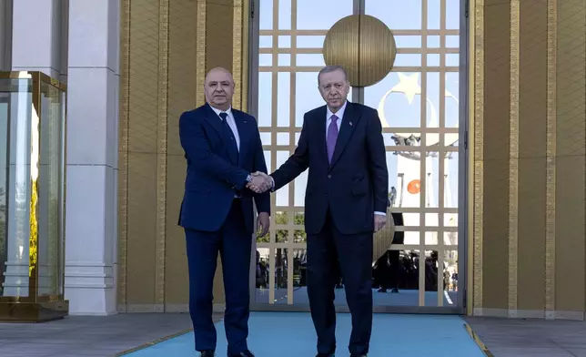 Turkish President Recep Tayyip Erdogan, right, shakes hands with his Lebanese counterpart Joseph Aoun before their meeting at the presidential palace in Ankara, Thursday, July 30, 2026. (Ugur Yildirim/DIA Photo via AP)