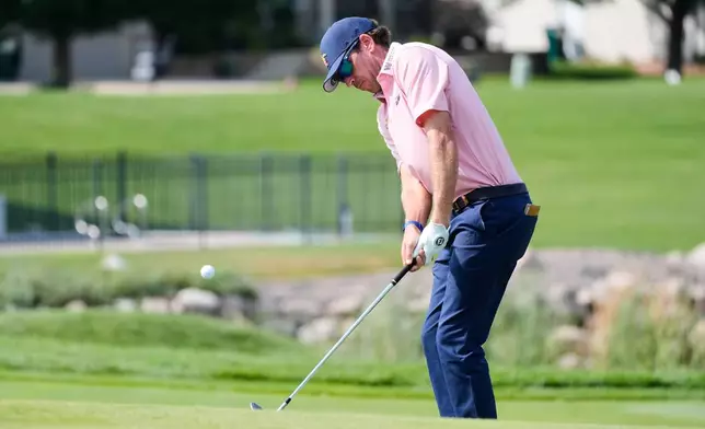 Ben Kohles hits from the 16th hole during the first round of the 3M Open golf tournament at the Tournament Players Club Thursday, July 23, 2026, in Blaine, Minn. (AP Photo/Bruce Kluckhohn)