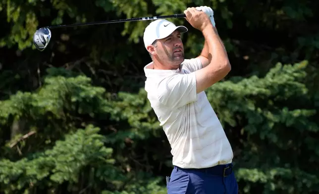 Scottie Scheffler hits from the second tee during the first round of the 3M Open golf tournament at the Tournament Players Club Thursday, July 23, 2026, in Blaine, Minn. (AP Photo/Bruce Kluckhohn)