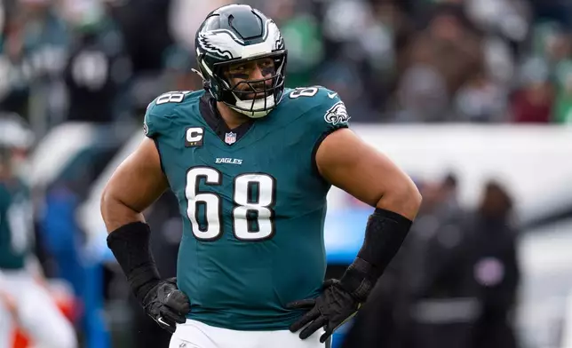 FILE - Philadelphia Eagles tackle Jordan Mailata looks on during an NFL football game against the Las Vegas Raiders, Dec. 14, 2025, in Philadelphia. (AP Photo/Chris Szagola, File)