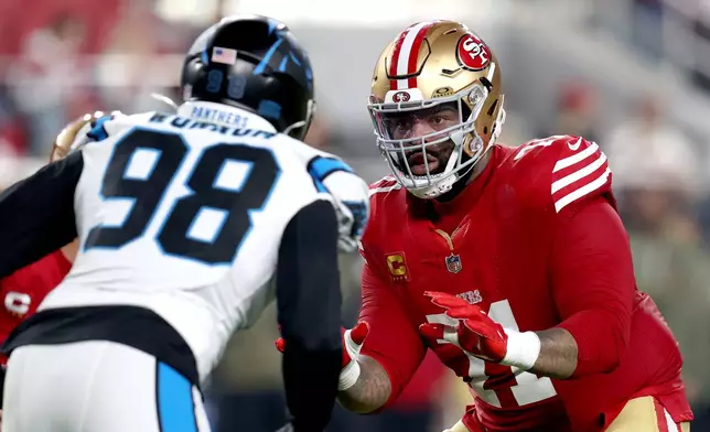 FILE - San Francisco 49ers offensive tackle Trent Williams (71) blocks during an NFL football game against the Carolina Panthers, Nov. 24, 2025, in Santa Clara, Calif. (AP Photo/Scot Tucker, File)