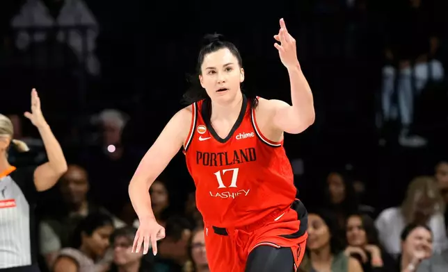 Portland Fire center Megan DiLeo (17) reacts after scoring against the Las Vegas Aces during the first half of an WNBA basketball game Tuesday, July 28, 2026, in Las Vegas. (Steve Marcus/Las Vegas Sun via AP)