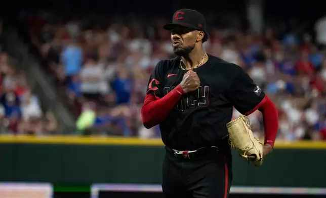 Cincinnati Reds pitcher Hunter Greene reacts after striking out a Chicago Cubs batter in the seventh inning of a baseball game Friday, July 10, 2026, in Cincinnati. (AP Photo/Michael Swensen)