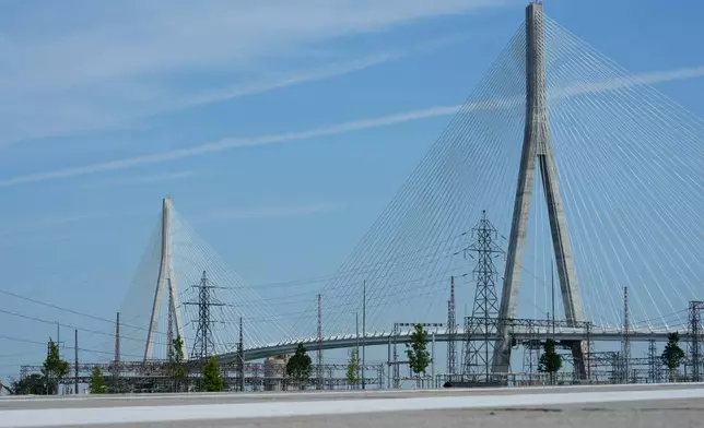 The Gordie Howe International bridge connects Detroit and Windsor, Ontario is shown Friday, July 24, 2026, in Windsor. (AP Photo/Paul Sancya)