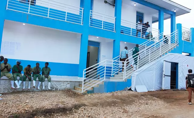 A view of health workers at the Evangelical Medical Center Bunia, eastern Congo, Friday, July 3, 2026, where Ebola clinical trials are scheduled to place, (AP Photo/Dirole Lotsima Dieudonne)