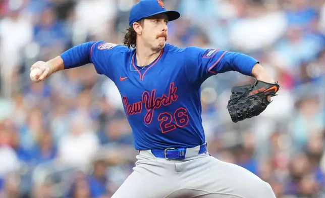 New York Mets pitcher Nolan McLean (26) works against the Toronto Blue Jays during the first inning of a baseball game in Toronto on Tuesday, June 30, 2026. (Nathan Denette/The Canadian Press via AP)