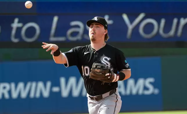 Chicago White Sox's Chase Meidroth throws out Cleveland Guardians' Travis Bazzana during the fourth inning of a baseball game, Sunday, July 5, 2026, in Cleveland. (AP Photo/Phil Long)