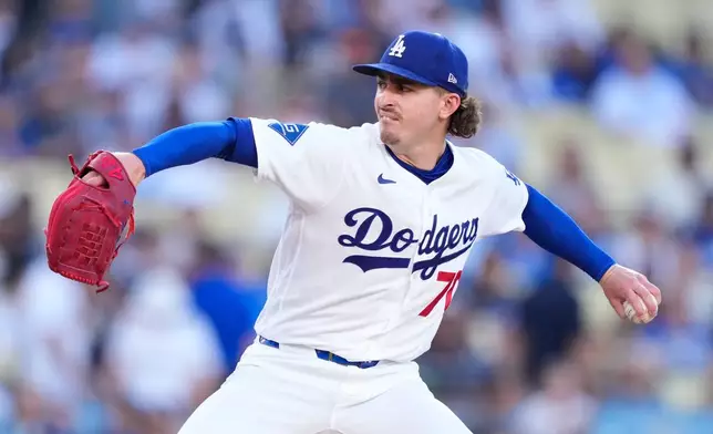 Los Angeles Dodgers starting pitcher Justin Wrobleski throws to the plate during the first inning of a baseball game against the Colorado Rockies, Tuesday, July 7, 2026, in Los Angeles. (AP Photo/Mark J. Terrill)