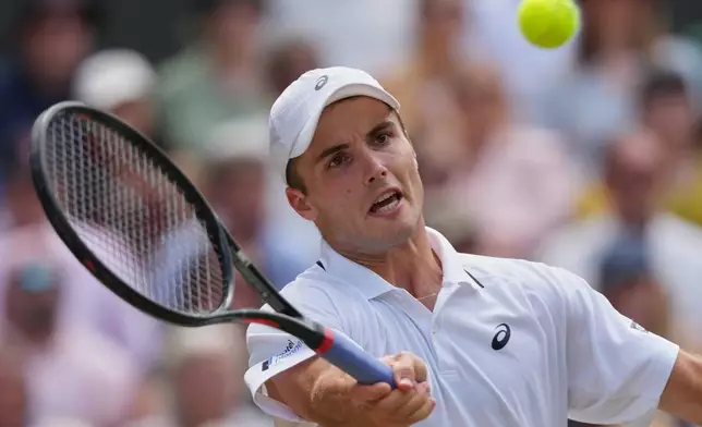 Arthur Fery of Britain plays a rerun to Alexander Zverev of Germany during their men's singles semifinal match at the Wimbledon Tennis Championships in London, Friday, July 10, 2026. (AP Photo/Kirsty Wigglesworth)