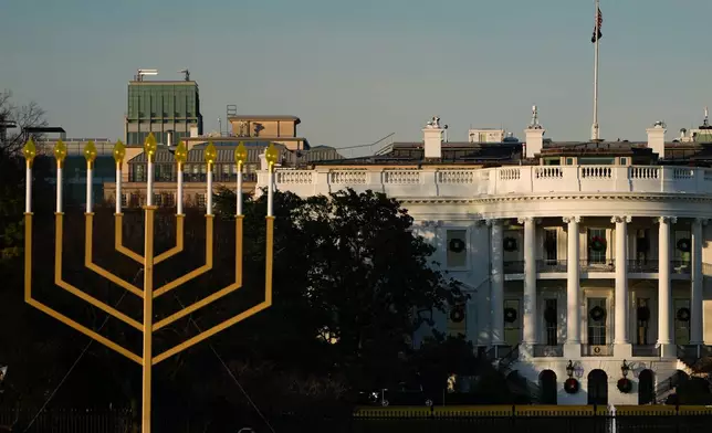 FILE - A large menorah stands in front of the White House on the third night of Hanukkah, Dec. 16, 2025, in Washington. (AP Photo/Julia Demaree Nikhinson, File)