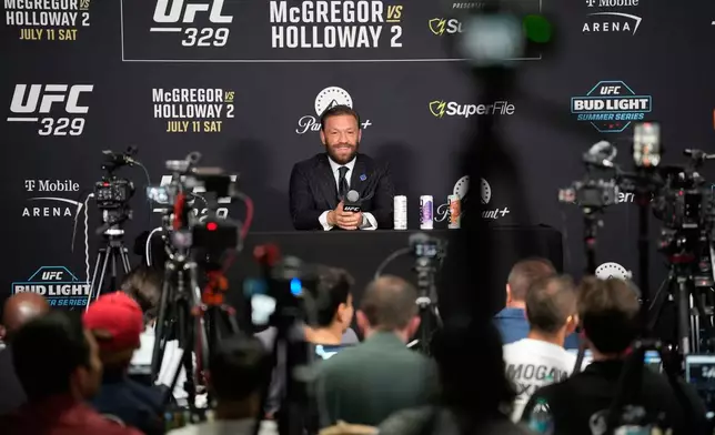 Conor McGregor speaks during a news conference for the UFC 329 mixed martial arts event Wednesday, July 8, 2026, in Las Vegas. (AP Photo/John Locher)
