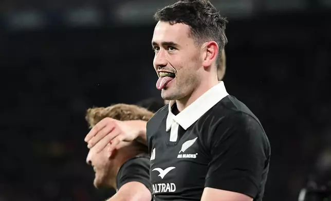 New Zealand's Will Jordan reacts after scoring his 50th test try during the Nations Championship rugby international between the All Blacks and Italy in Wellington, New Zealand, Saturday, July 11, 2026. (Kerry Marshall/Photosport via AP)