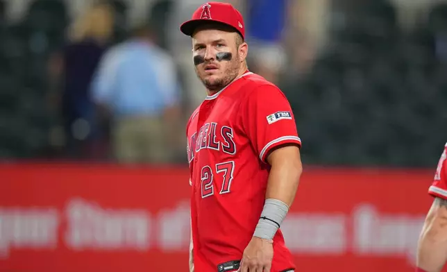 Los Angeles Angels designated hitter Mike Trout looks on following a baseball game against the Texas Rangers, Wednesday, July 8, 2026, in Arlington, Texas. (AP Photo/Julio Cortez)