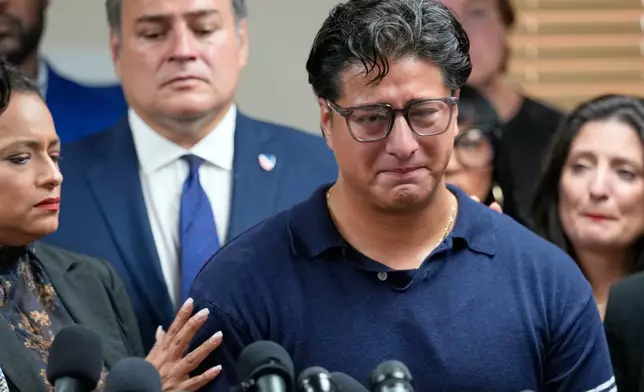 Ronaldo Salgado, son of Lorenzo Salgado Araujo, speaks during a news conference Wednesday, July 8, 2026, in Houston. (AP Photo/David J. Phillip)