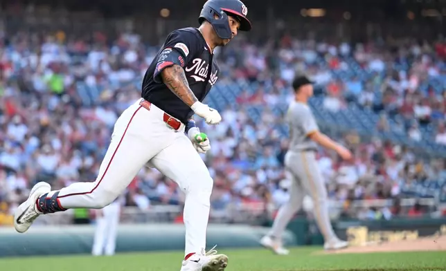 Washington Nationals' Daylen Lile runs the bases after hitting a solo home run during the second inning of a baseball game against the Pittsburgh Pirates, Friday, July 3, 2026, in Washington. (AP Photo/John McDonnell)