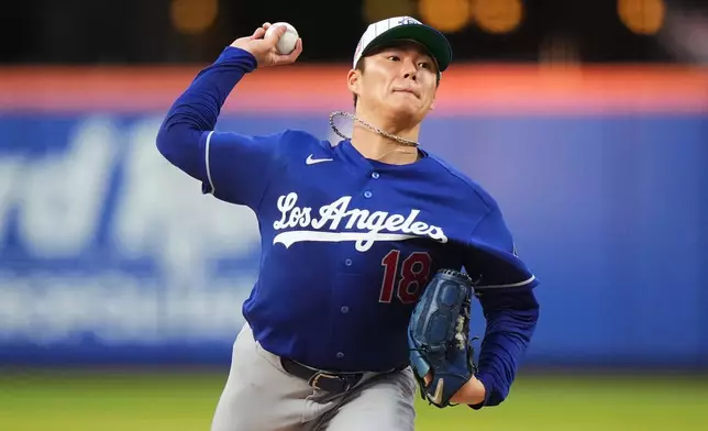 Los Angeles Dodgers' Yoshinobu Yamamoto pitches during the second inning of a baseball game against the New York Mets Saturday, July 25, 2026, in New York. (AP Photo/Frank Franklin II)