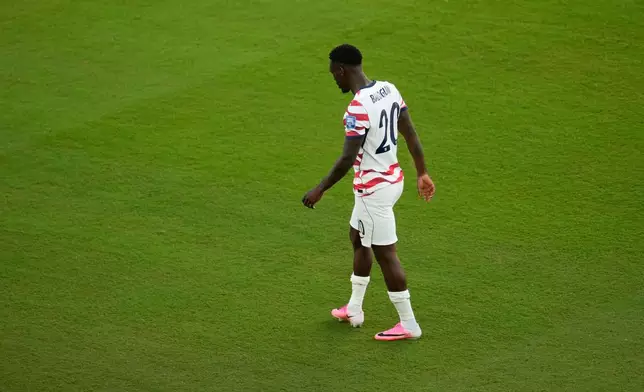 United States' Folarin Balogun (20) reacts to a red card during the World Cup round of 32 soccer match between the United States and Bosnia in Santa Clara, Calif., near San Francisco, Wednesday, July 1, 2026. (AP Photo/Jeff Chiu)