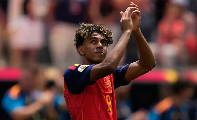 Spain's Lamine Yamal (19) celebrates at the end of the World Cup quarterfinal soccer match between Spain and Belgium in Inglewood, Calif., near Los Angeles, Friday, July 10, 2026. (AP Photo/Gregory Bull)