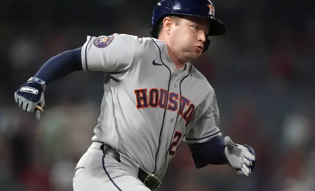 Houston Astros' Nick Allen (20) doubles against the Los Angeles Angels during the ninth inning of a baseball game Tuesday, July 28, 2026, in Anaheim, Calif. (AP Photo/Scott Strazzante)