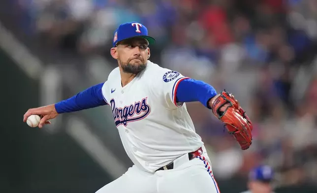Texas Rangers starting pitcher Nathan Eovaldi throws during the first inning of a baseball game against the Seattle Mariners, Saturday, July 25, 2026, in Arlington, Texas. (AP Photo/LM Otero)