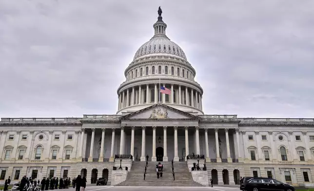 An Armed Forces Body Bearer Team moves the casket of Sen. Lindsey Graham, R-S.C., from the U.S. Capitol, Tuesday, July 28, 2026, in Washington. (AP Photo/Rod Lamkey, Jr.)
