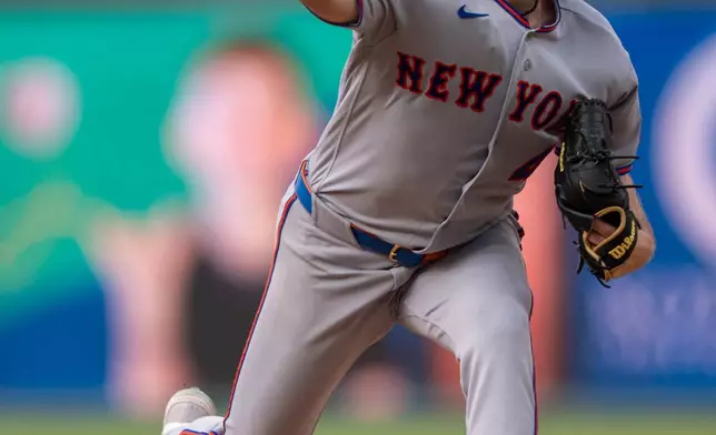 New York Mets starting pitcher Christian Scott delivers during the first inning of a baseball game against the Philadelphia Phillies, Thursday, July 16, 2026, in Philadelphia. (AP Photo/Chris Szagola)