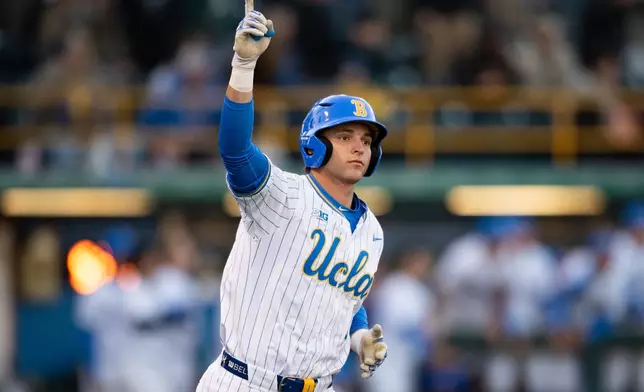 FILE - UCLA's Roch Cholowsky reacts after hitting a home run during an NCAA baseball game against Texas Christian, Feb. 20, 2025, in Los Angeles. (AP Photo/Kyusung Gong, File)