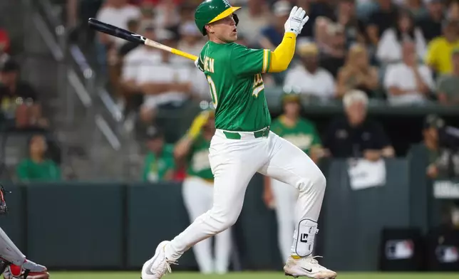 Athletics' Brian Serven hits a two-run home run during the seventh inning of a baseball game against the Boston Red Sox Tuesday, July 28, 2026, in West Sacramento, Calif. (AP Photo/Scott Marshall)