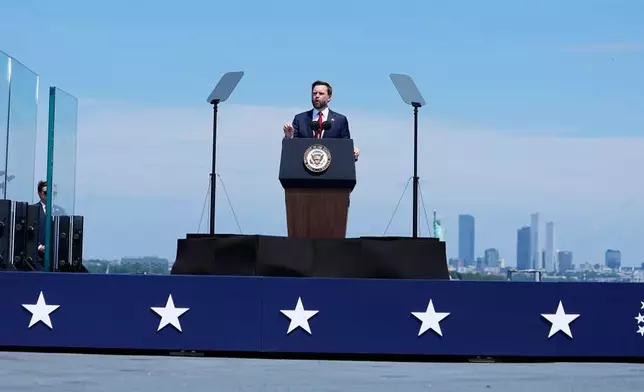 Vice President JD Vance speaks on the flight deck of the USS Kearsarge (LHD-3) in the New York harbor during The International Naval Review honoring America's 250th Anniversary, Saturday, July 4, 2026, in New York. (AP Photo/Frank Franklin II)