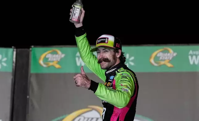 Ryan Blaney celebrates after winning a NASCAR Cup Series auto race, Sunday, July 12, 2026, in Hampton, Ga. (AP Photo/Mike Stewart)