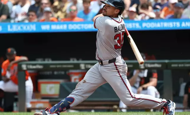 Atlanta Braves' Drake Baldwin hits a single during the third inning of a baseball game against the Baltimore Orioles, Sunday, July 26, 2026, in Baltimore. (AP Photo/Daniel Kucin Jr.)