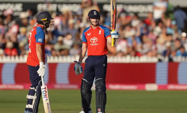 England's Harry Brook celebrates reaching 50 runs during the fourth Vitality IT20 match against India at the Seat Unique Stadium in Bristol, England, on Thursday July 9, 2026. (Steven Paston/PA via AP)